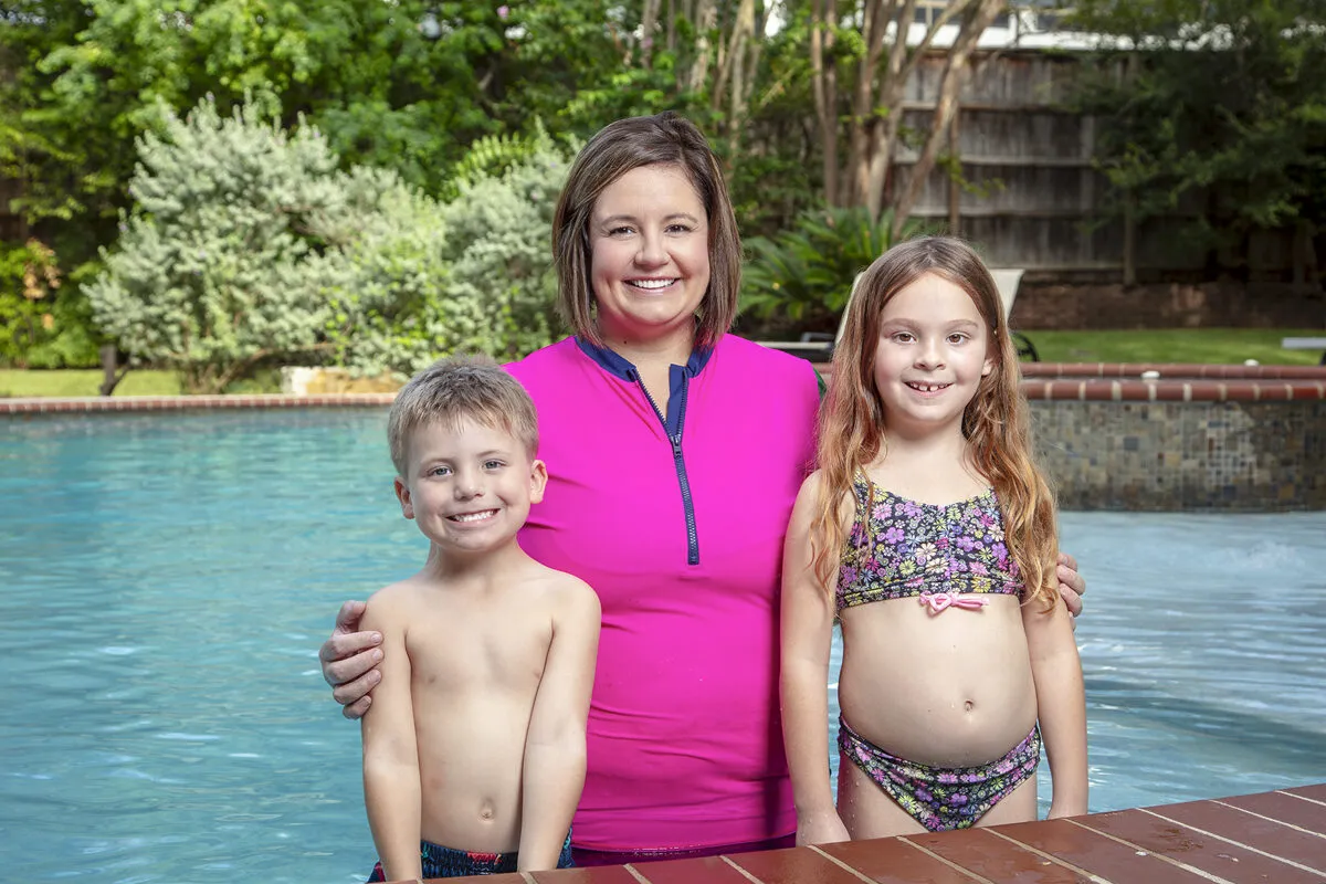 Crystal teaching swim lessons in the pool